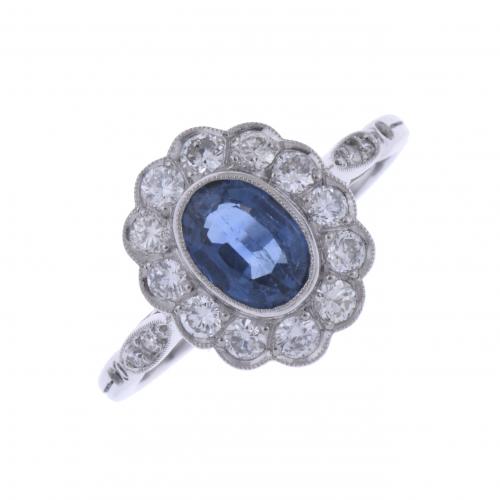 PLATINUM ROSETTE RING.