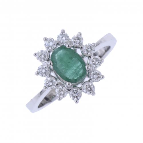 WHITE GOLD RING WITH DIAMONDS AND EMERALD.