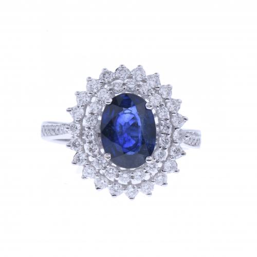 DIAMONDS AND SAPPHIRE ROSETTE RING.