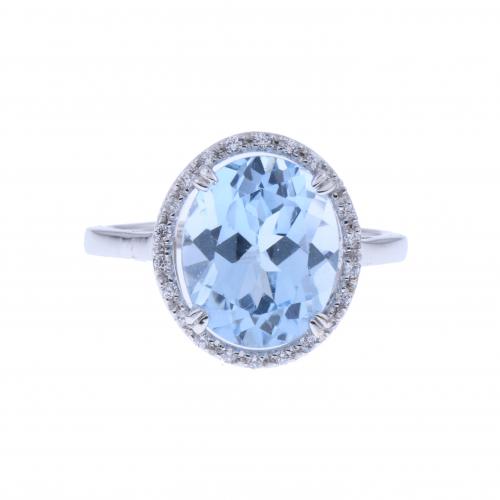 RING WITH LARGE BLUE TOPAZ.