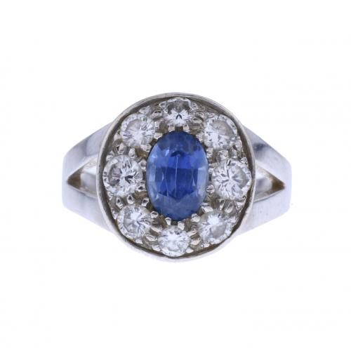 DIAMONDS AND SAPPHIRE ROSETTE RING.