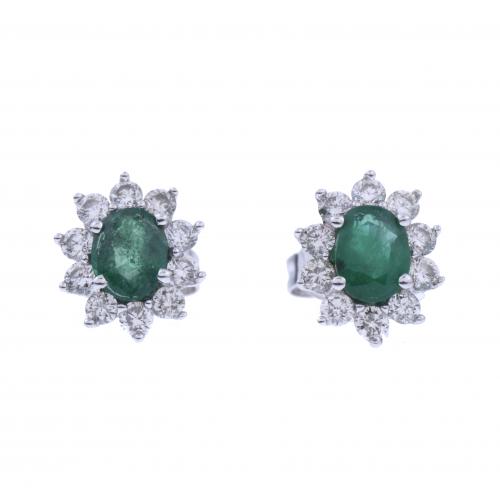 DIAMONDS AND EMERALDS ROSETTE EARRINGS.