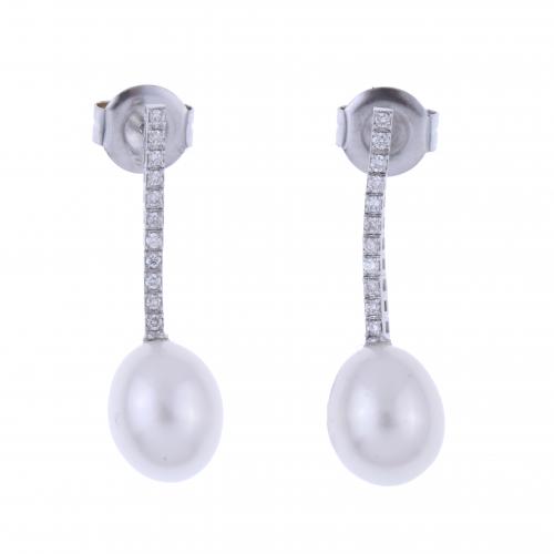 DIAMONDS AND PEARL LONG EARRINGS.