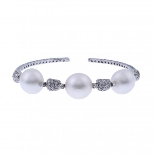 DIAMONDS AND PEARLS RIGID BRACELET.