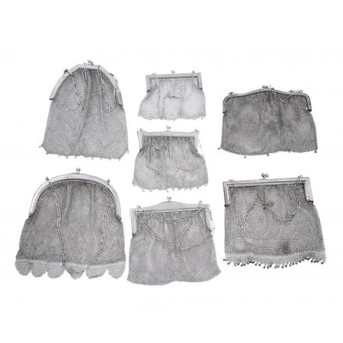 SEVEN BAGS IN SILVER MESH AND SILVERY METAL, EARLY 20TH CENTURY.