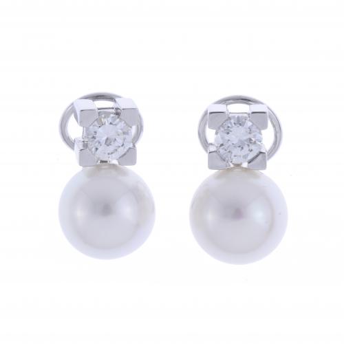 PEARL AND DIAMOND YOU AND ME EARRINGS.