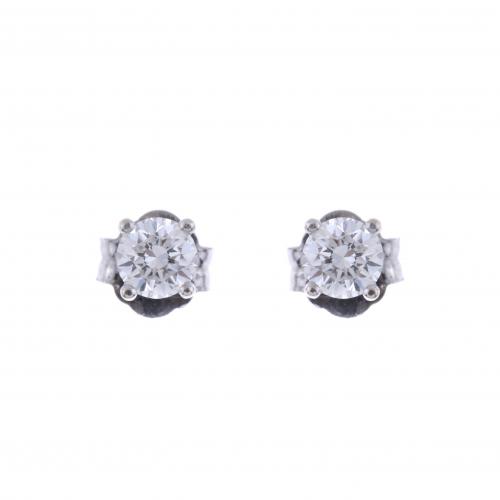 DIAMOND STUD EARRINGS.