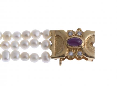 BRACELET WITH SMALL PEARLS.