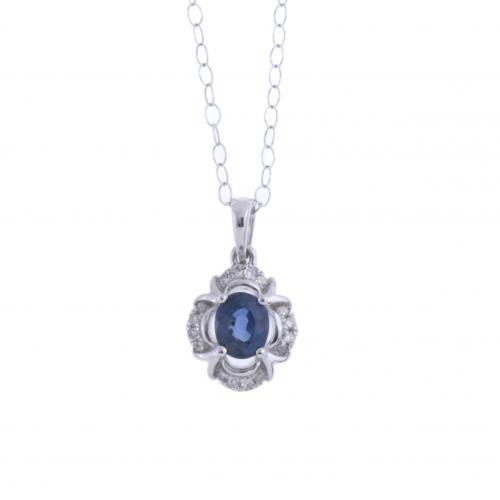 SAPPHIRE AND DIAMONDS FLOWER PENDANT.