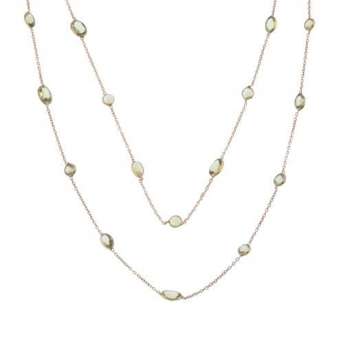 GILT SILVER AND OLIVINE LONG NECKLACE.