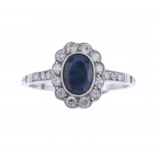 ROSETTE RING WITH SAPPHIRE.