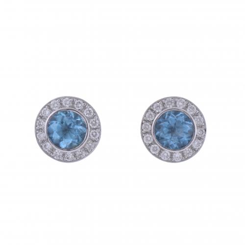 BIRD'S EYE EARRINGS WITH TOPAZ AND DIAMONDS.