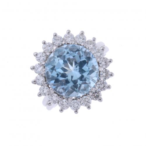 ROSETTE RING WITH BLUE TOPAZ AND DIAMONDS.