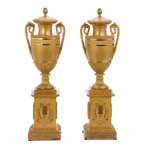 AFTER MODELS BY PIERRE-PHILIPPE THOMIRE (1751-1843). PAIR OF FRENCH TROPHY-SHAPED GOBLETS, CIRCA 1810-1815. 