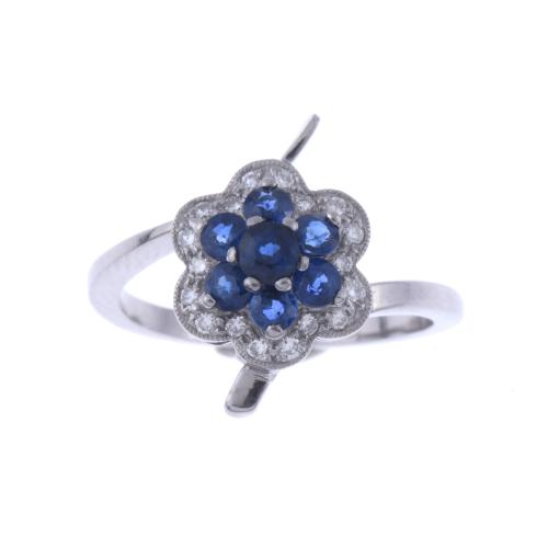 SAPPHIRES AND DIAMONDS FLORAL RING.