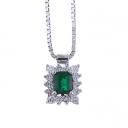 PENDANT WITH DIAMONDS AND EMERALD.