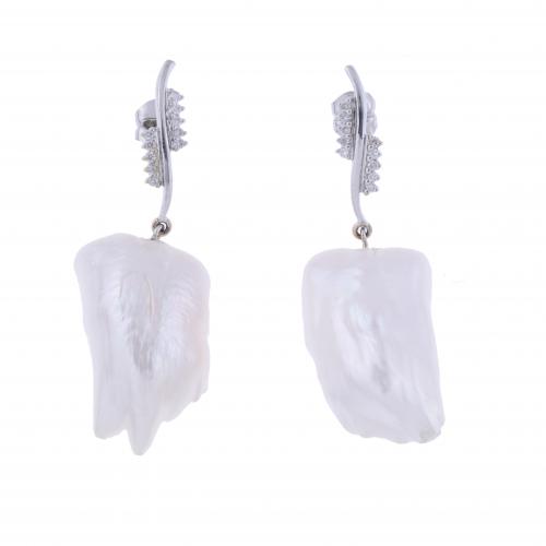 LONG EARRINGS WITH BAROQUE PEARL AND DIAMONDS.