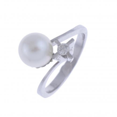 YOU AND ME RING WITH DIAMOND AND PEARL.