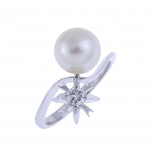 YOU AND ME RING WITH DIAMOND AND PEARL.