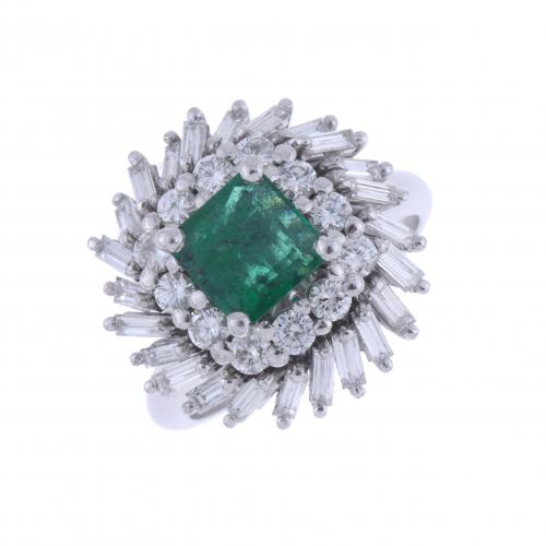 DIAMONDS AND EMERALD DANCER RING.