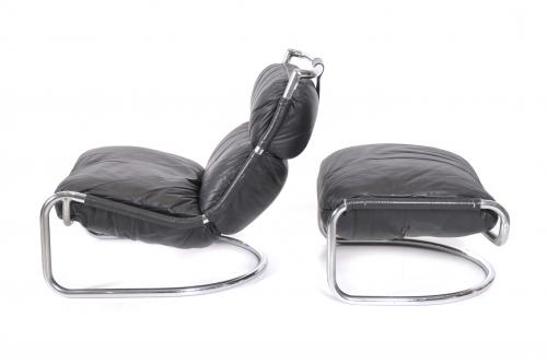 AFTER MODELS BY GAE AULENTI (1927-2012). LEATHER ARMCHAIR W