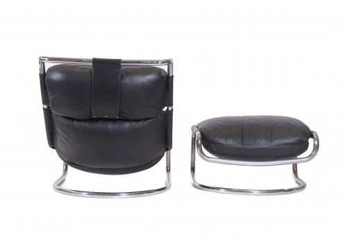 AFTER MODELS BY GAE AULENTI (1927-2012). LEATHER ARMCHAIR W