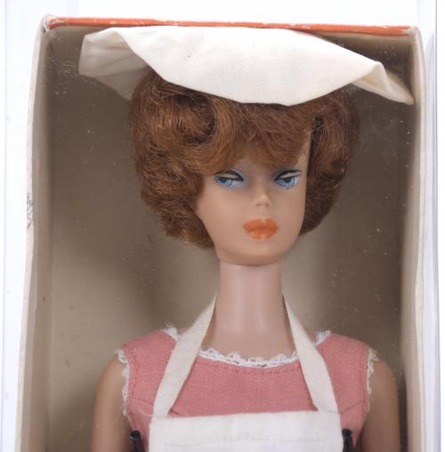 MATTEL. BARBIE DOLL MODEL "BRUNETTE - BUBBLE CUT" WITH "BAR