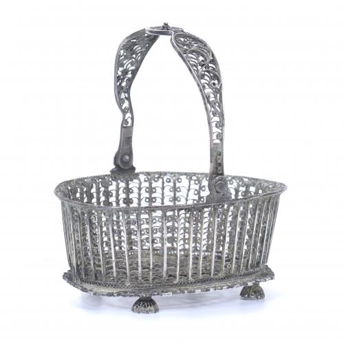 SMALL ENGLISH BASKET IN OPENWORK SILVER, 1936.