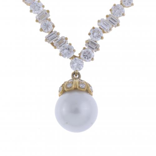 NECKLACE WITH DIAMONDS AND PEARL.