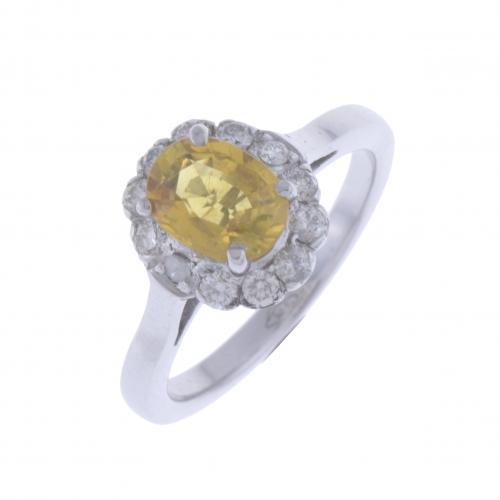 ROSETTE RING WITH A YELLOW SAPPHIRE AND DIAMONDS.