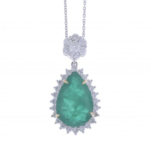 EMERALD AND DIAMONDS ROSETTE PENDANT.