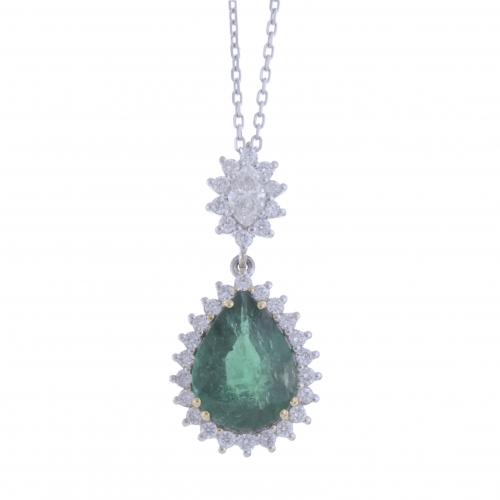 EMERALD AND DIAMONDS ROSETTE PENDANT.