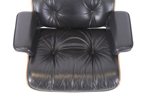 CHARLES & RAY EAMES FOR VITRA. ARMCHAIR WITH OTTOMAN.