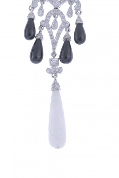 GIRANDOLE EARRINGS WITH DIAMONDS AND ONYX.