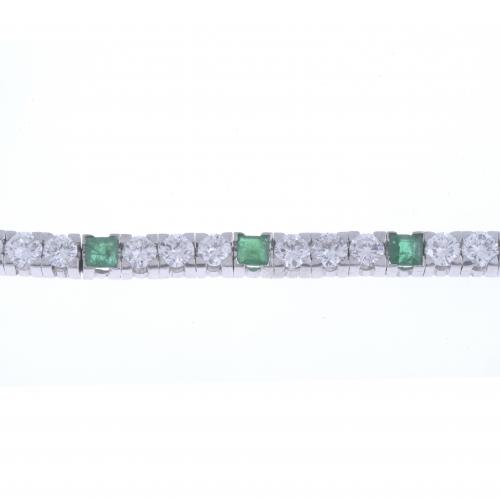 DIAMONDS AND EMERALDS RIVIERE BRACELET.