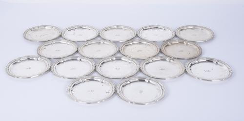 SIXTEEN BARCELONA SILVER BREAD DISHES, 20TH CENTURY.