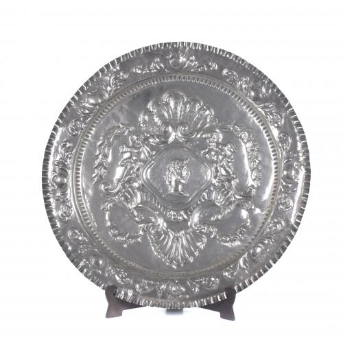 LARGE EMBOSSED SILVER DISH, 19TH CENTURY.