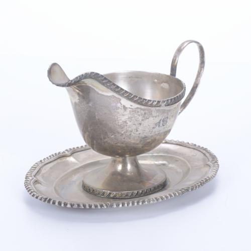 SILVER SAUCE BOAT ON PLATTER, 20TH CENTURY.