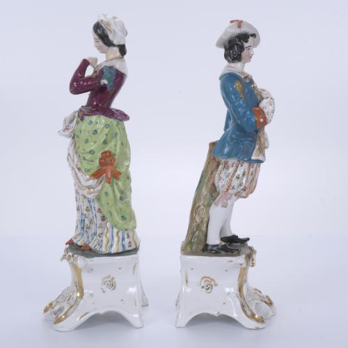 PARIS MANUFACTURE. PAIR OF PORCELAIN FIGURES FROM NAPOLEON