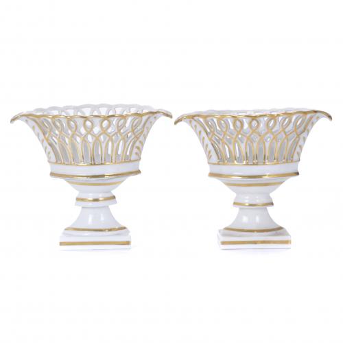 AFTER MODELS BY REAL FÁBRICA DE PORCELANA DEL BUEN RETIRO. PAIR OF SMALL FERNDINAND FRUIT BOWLS.