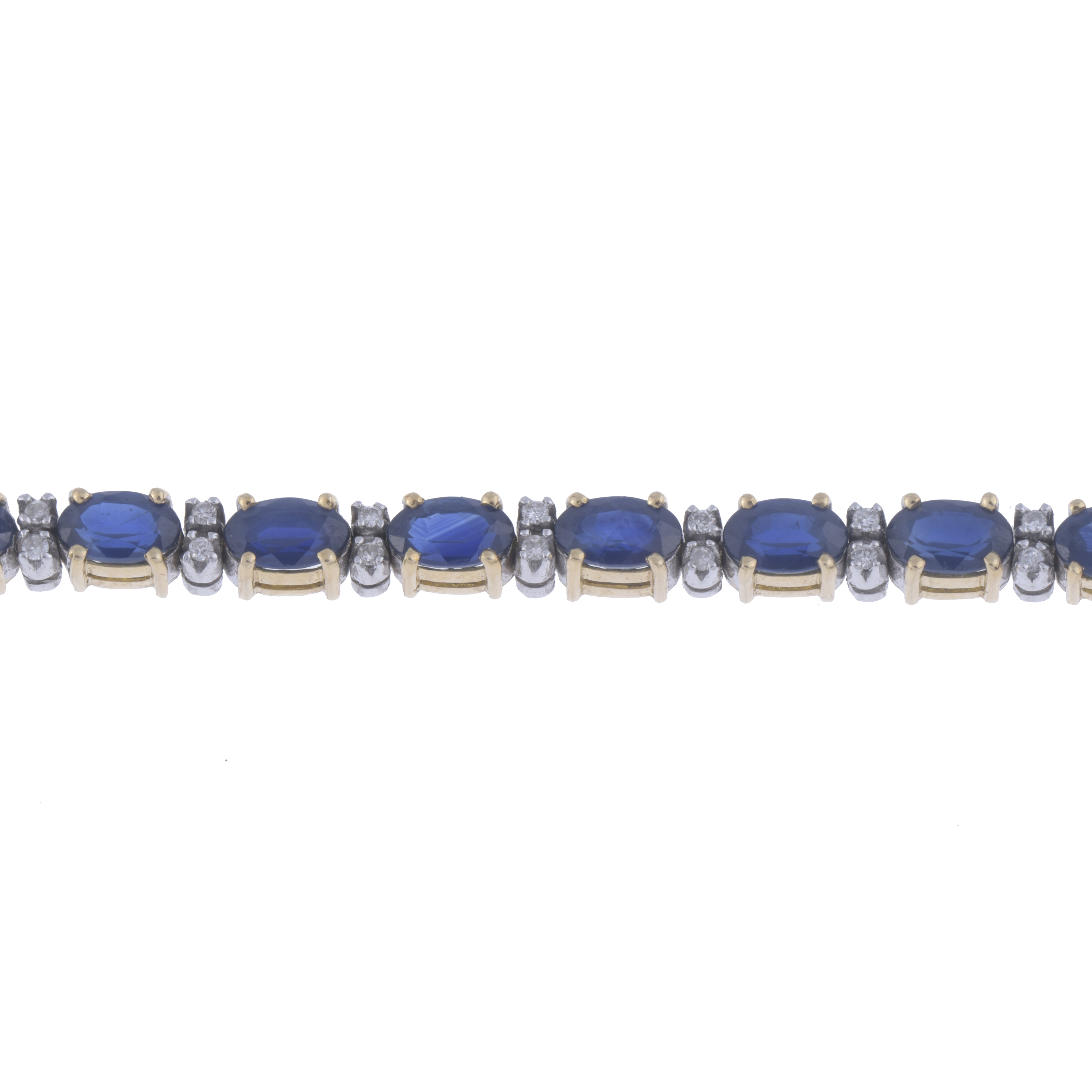 RIVIÈRE BRACELET WITH SAPPHIRES AND DIAMONDS.