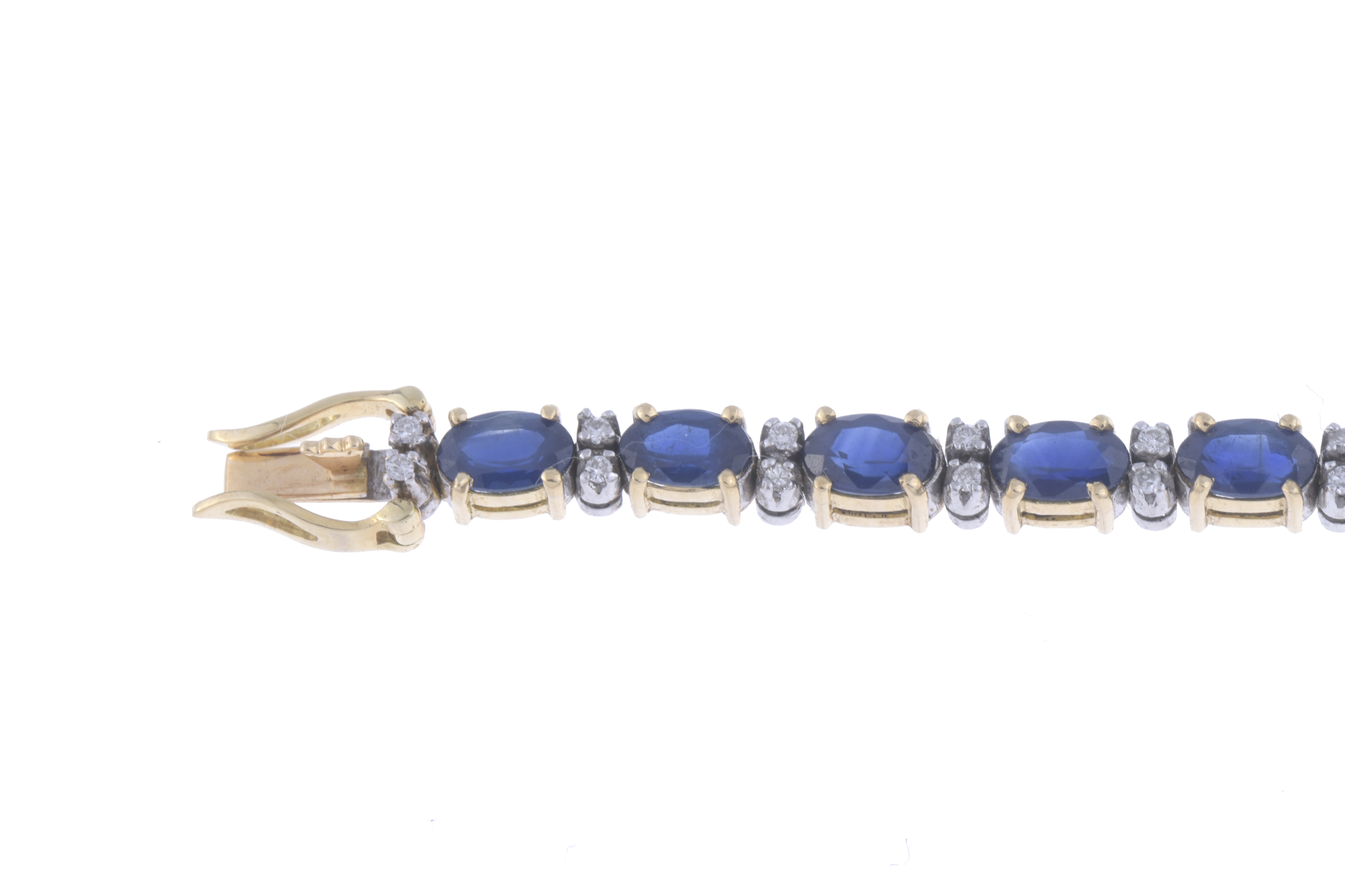 RIVIÈRE BRACELET WITH SAPPHIRES AND DIAMONDS.