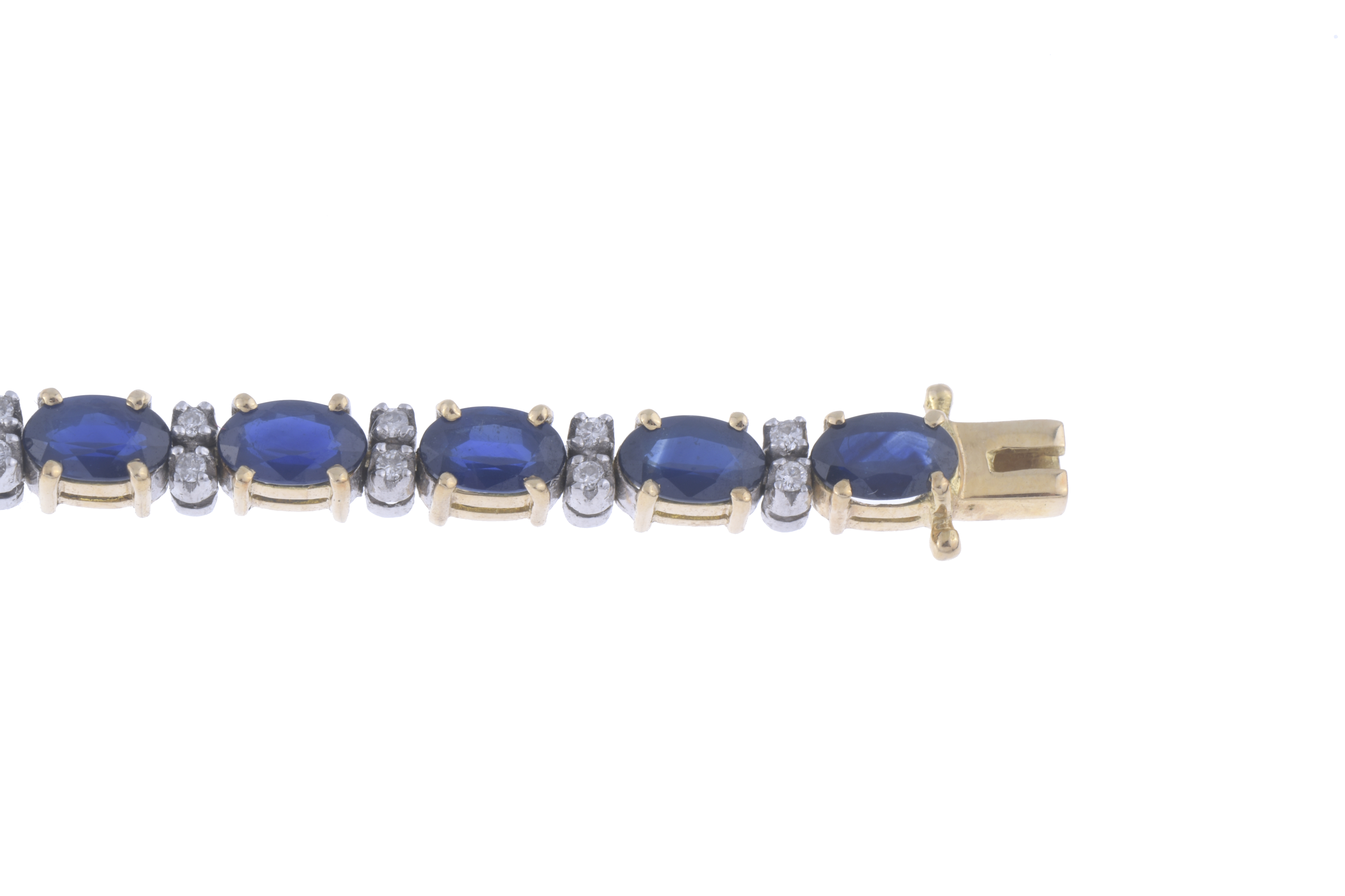 RIVIÈRE BRACELET WITH SAPPHIRES AND DIAMONDS.