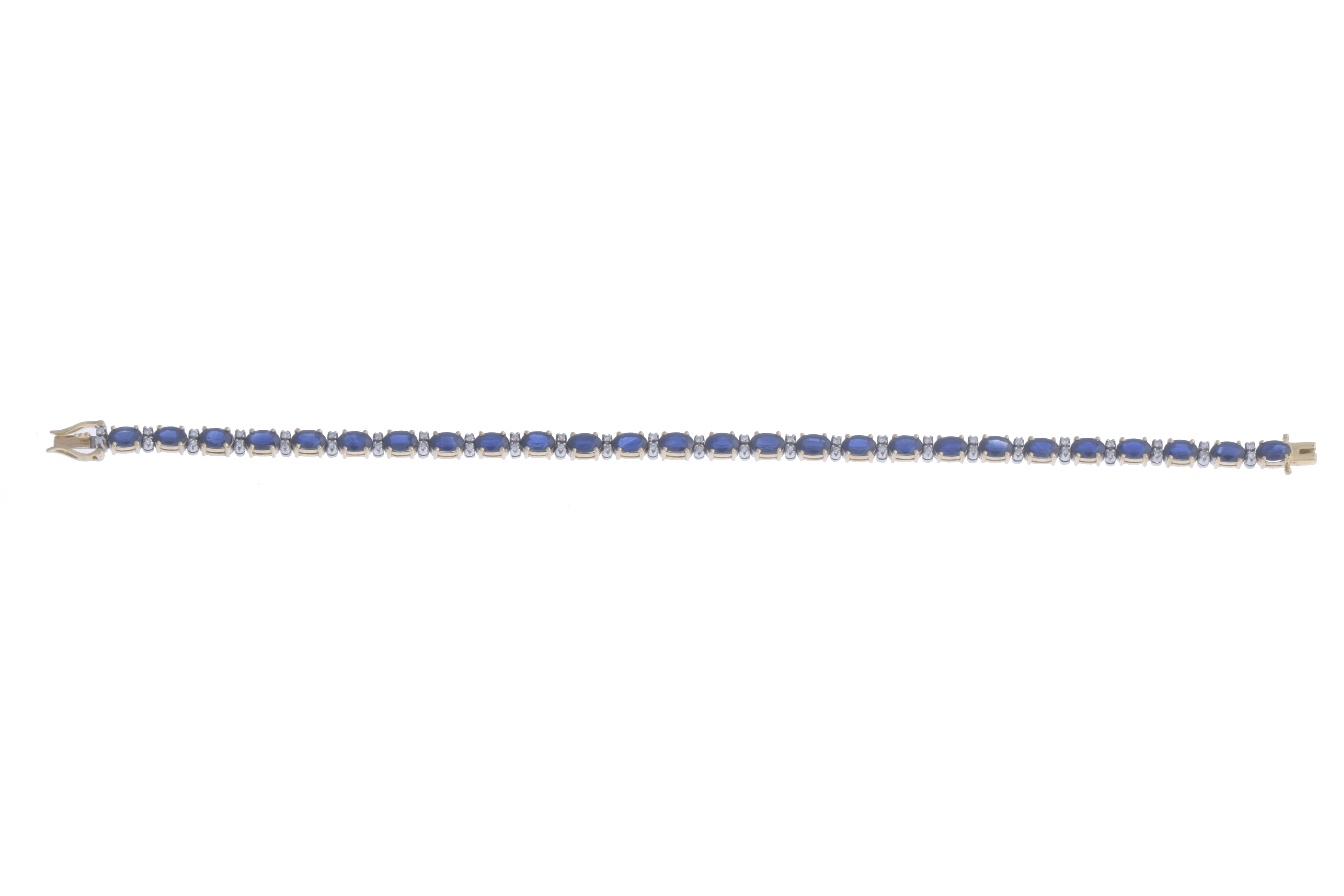 RIVIÈRE BRACELET WITH SAPPHIRES AND DIAMONDS.