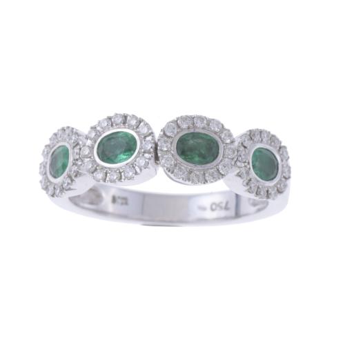 RING WITH FOUR ROSETTES OF DIAMONDS AND EMERALDS.