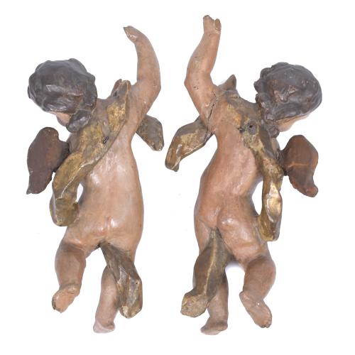 PAIR OF PUTTI IN POLYCHROME CARVING, MID 20TH CENTURY.