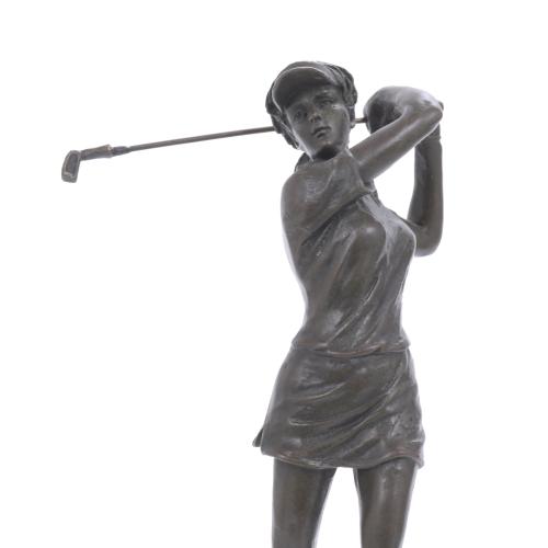 GOLF PLAYER SCULPTURE.