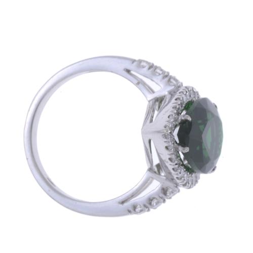 RING WITH GREEN TOPAZ AND DIAMONDS.