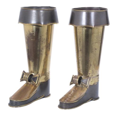 PAIR OF UMBRELLA STANDS IMITATING MEN'S GALA BOOTS, 17TH CENTURY.