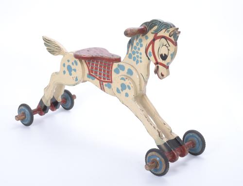 TWO CHILDREN&#39;S TOY HORSES.